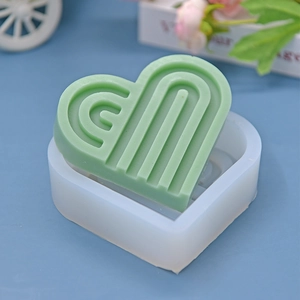 Striped heart silicone mold for DIY baking and candles with a modern geometric pattern