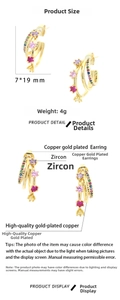 Detail showing 7x19mm gold-plated C-shaped earrings with colorful zircon stones