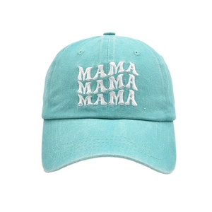 Detail of white MAMA 3D embroidery on washed cotton mint green baseball cap