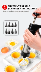 Detail of stainless steel cookie press with 8 durable nozzles for cream piping and baking
