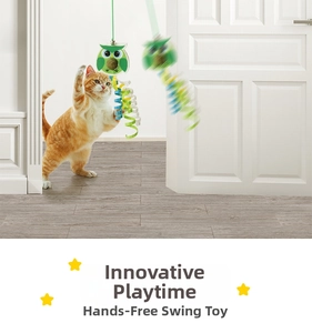 Close-up of owl-shaped hanging cat toy with colorful tassels and elastic string detail