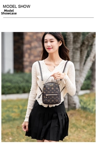 Outdoor model show of a mini monogram backpack with gold zippers and adjustable straps