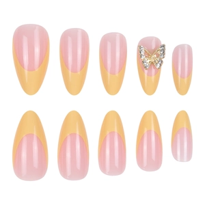 Yellow French tip almond press-on nails with rhinestone butterfly and pink base
