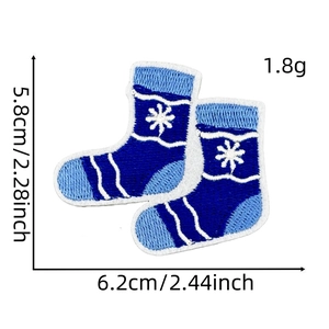 Detail of blue Christmas stocking embroidered patch with dimensions 5.8x6.2cm and weight 1.8g