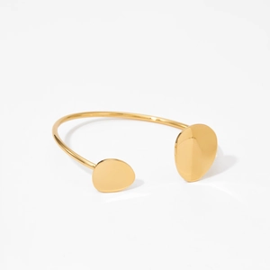 Polished gold plated stainless steel open bangle bracelet with asymmetric oval ends
