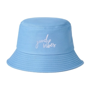 Sky blue cotton bucket hat with white Good Vibes embroidery on a clean white background