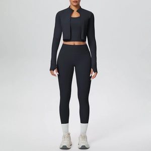 Detailed view of women's 3-piece gym set with zip jacket, sports bra, and yoga leggings