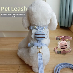 Detail view of corduroy bee-style pet harness showing the adjustable safety buckles and soft fabric
