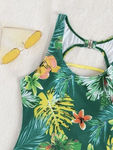 Detail of back cutout swimsuits with tropical floral print and metal buckle closure