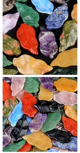 Detailed view of various colorful natural carved crystal and agate stone leaf pendants