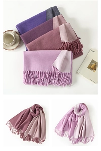 Detailed view of thick gradient faux rabbit fur scarf with decorative tassels