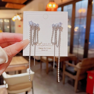 Élégantes boucles d'oreilles étoile à pampilles en argent 925 avec strass brillants