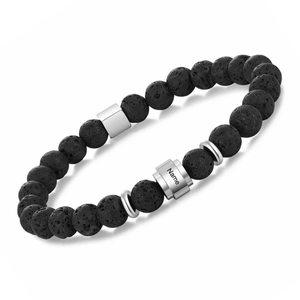 Detailed view of black lava stone beads with a customizable silver metal cylinder name tag