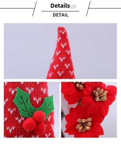 Detail of red knitted Christmas gnome fabric with holly leaf accents and golden beads