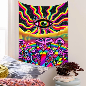 Detailed view of bohemian mushroom tapestry with psychedelic eye pattern in a cozy room