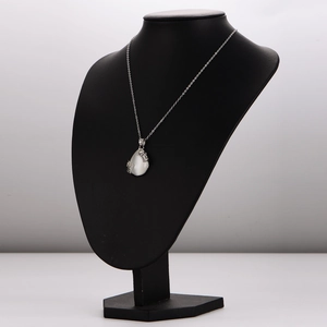 Elegant stainless steel necklace with waterdrop-shaped white gemstone and silver engraving