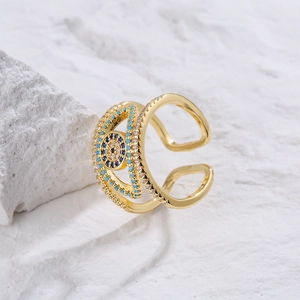 Adjustable 18K gold evil eye ring with sparkling blue and white zircon stones