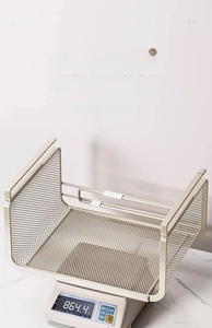 Detail shot of heavy-duty champagne gold metal storage basket on weight scale