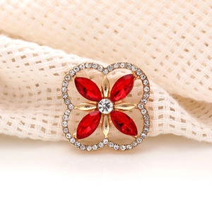 Golden clover accessory with red marquise crystals and sparkling rhinestones for DIY crafts