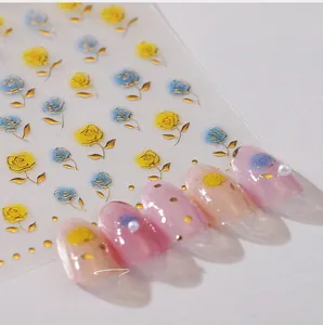 Détails de stickers nail art 3D roses bleues et jaunes avec bordures dorées