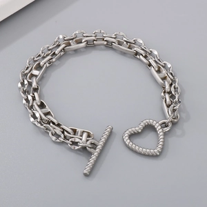 Double-layered titanium steel chain bracelet with a textured heart-shaped OT clasp