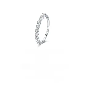 Macro view of S925 sterling silver stamp on minimalist stackable moissanite ring band