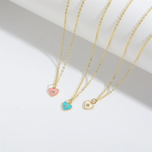 French vintage style heart pendant necklaces in pink blue and white with small rhinestones