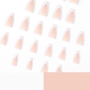 Detailed view of coffin-shaped pink nails with white French tips and silver glitter accents