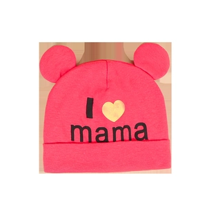 Pink knitted baby hat with cute round ears and I love mama print for warmth and style