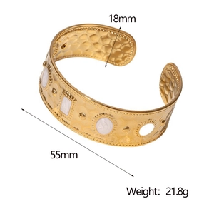 Detail view of 18K gold plated stainless steel cuff with measurements and white enamel