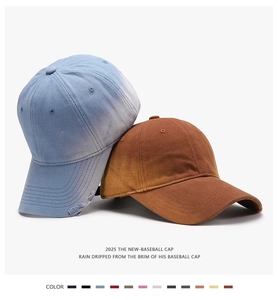 Detail of vintage washed baseball caps with distressed brims and cotton fabric texture