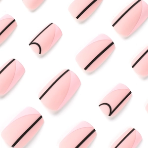 Matte pink french style press-on nails with minimalist black geometric line art designs