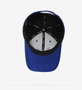 Detailed interior of royal blue cotton baseball cap with Fashion webbing and metal buckle