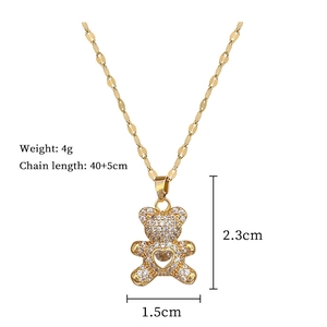 Detail view of bear necklace showing dimensions 2.3x1.5cm and chain length 40+5cm