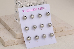 Set of 6 pairs polished stainless steel ball earrings displayed on white card board