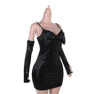 Detail view of black sequined velvet mini dress with matching detachable sleeves