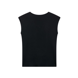 Detail of black knitted sleeveless top featuring fine ribbed texture and round neckline