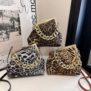 Leopard print shell handbag with chunky gold chain and metal frame in three retro colors