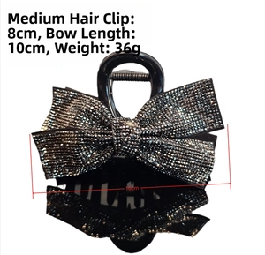Detailed size view of black rhinestone bow claw clip with dimensions and weight