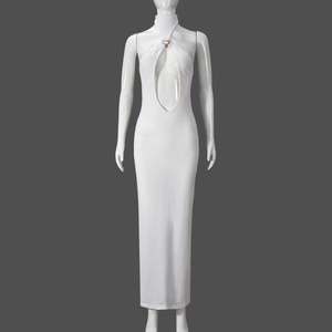 Close-up of white halter maxi dress featuring metal ring detail and cutout chest design
