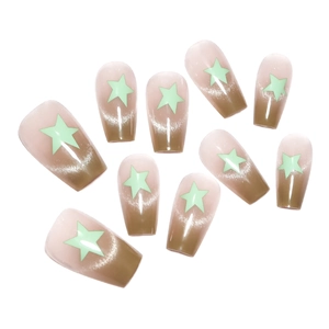 Short coffin press on nails featuring green cat eye gradient and Y2K star design