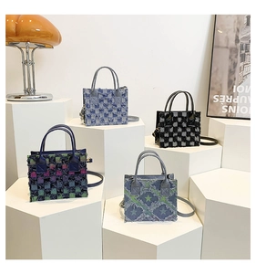 Detail view of woven check crossbody bags with frayed edges in four trendy colors