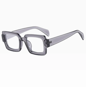 Detail view of stylish square transparent gray frame glasses with a clear lens finish