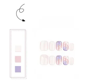 Short square press-on nails with floral patterns, gold flakes in cream, pink, and purple