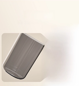 Detail view of thick grey translucent mouthwash cup with smooth rounded edges and large capacity