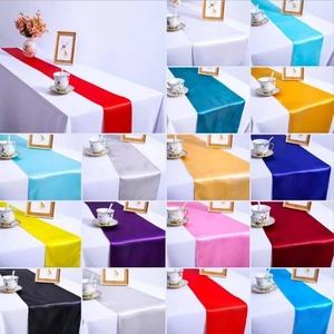 Glossy satin table runner collection in various colors for weddings and banquet decor