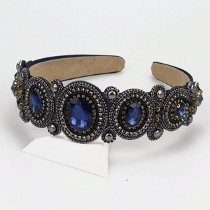 Baroque style wide headband with navy blue gemstones and intricate beaded embroidery