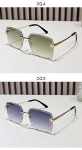 Macro detail of rimless square sunglasses with hand-set rhinestones and gold metal temples