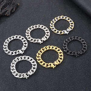 Hip-hop Cuban link bracelets in gold, silver and black finishes on dark background