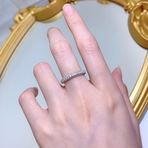 Close-up of a delicate S925 silver ring featuring shimmering white zircon pavé stones